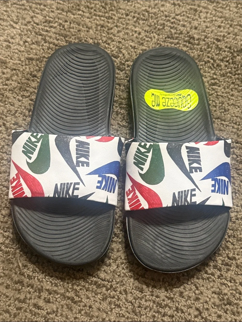 Nike Kids Black Slide Sandals with Red Green and Blue Logo Strap